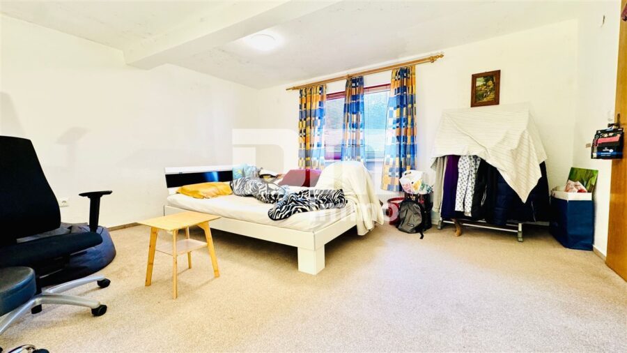 Charmantes Raumwunder in Birkenfelde: Historisches Fachwerk trifft auf solide Moderne - OG Schlafzimmer 1